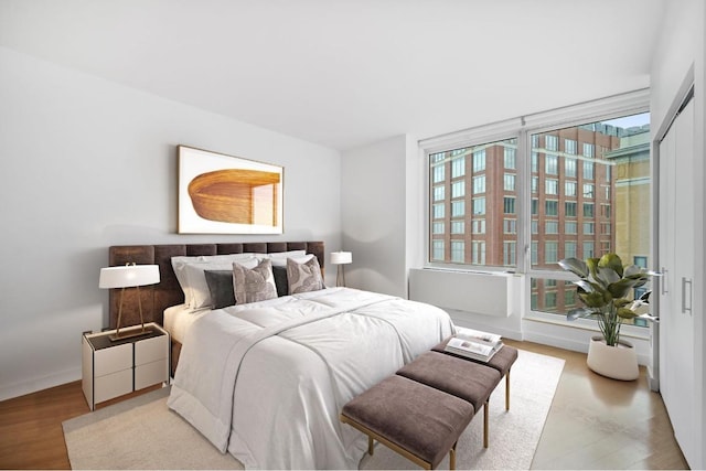 bedroom featuring light hardwood / wood-style flooring