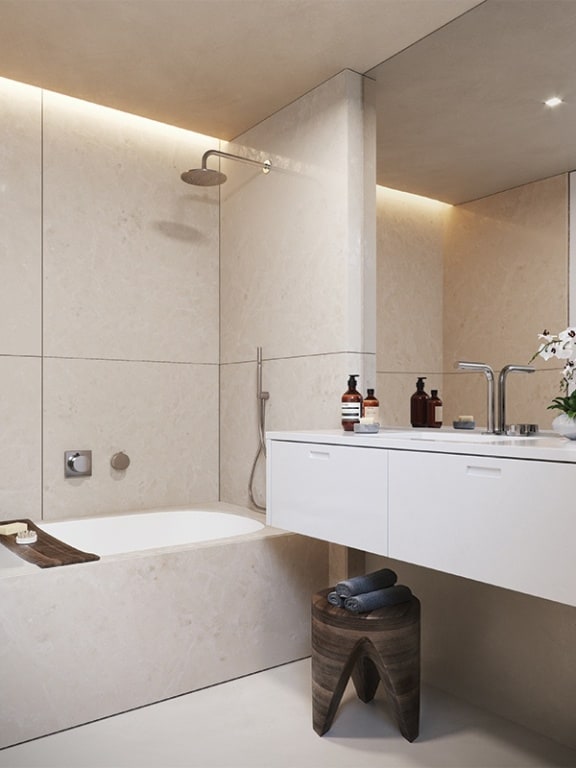 251 W 14th St Unit 9-B, New York City, NY 10011 - bathroom featuring tile walls, tiled shower / bath combo, and vanity
