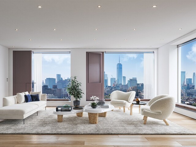 251 W 14th St Unit 9-B, New York City, NY 10011 - living room featuring light hardwood / wood-style flooring