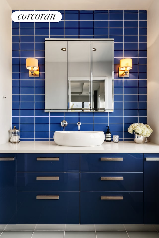 bathroom featuring backsplash and vanity