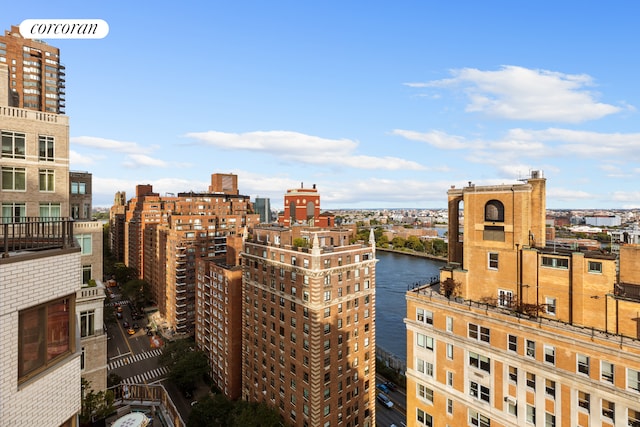 property's view of city featuring a water view