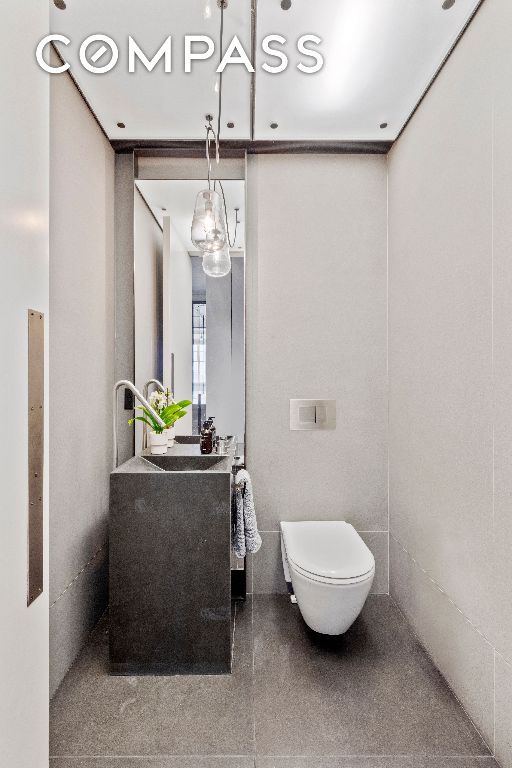 bathroom featuring toilet