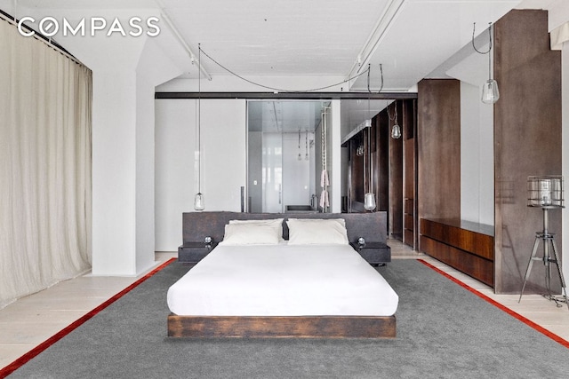 bedroom featuring light hardwood / wood-style floors