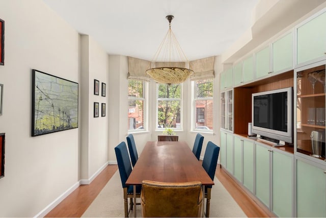 dining room with light wood-type flooring