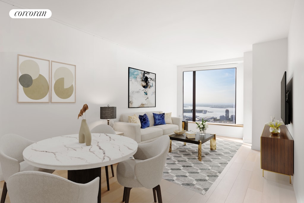 living area with visible vents and wood finished floors