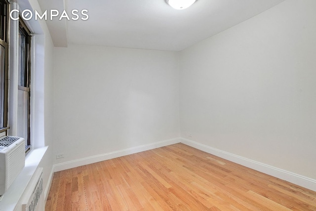 empty room featuring light hardwood / wood-style floors