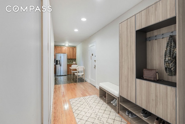 mudroom with hardwood / wood-style floors