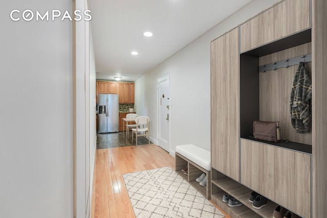 3840 Greystone Ave Unit 1K, New York City, NY 10463 - mudroom with light wood-style floors, recessed lighting, and baseboards