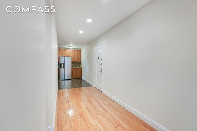 3840 Greystone Ave Unit 1K, New York City, NY 10463 - hall featuring light wood-style floors, recessed lighting, and baseboards
