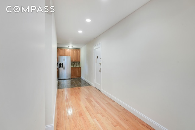 3840 Greystone Ave Unit 1K, New York City, NY 10463 - hallway featuring light wood-style flooring, recessed lighting, and baseboards