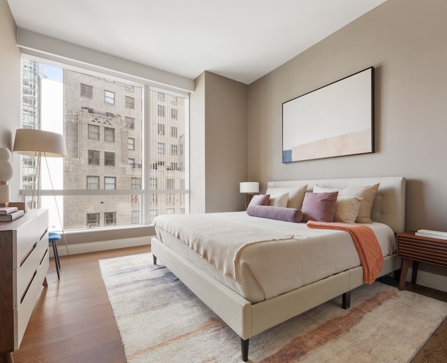 77 Greenwich St Unit 26C, New York City, NY 10006 - bedroom featuring wood finished floors