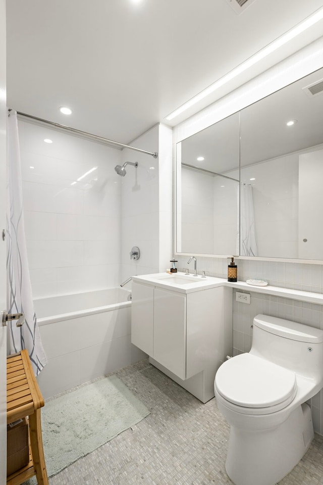 50 Riverside Blvd Unit 15-M, New York City, NY 10069 - bathroom featuring shower / bath combination with curtain, toilet, vanity, and recessed lighting