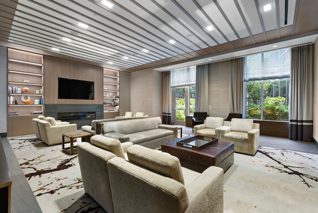 50 Riverside Blvd Unit 15-M, New York City, NY 10069 - living area with built in features and a glass covered fireplace