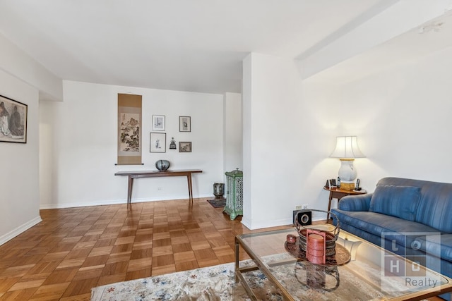 living room featuring baseboards