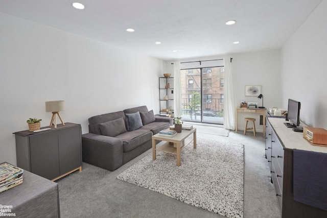 living room featuring light carpet