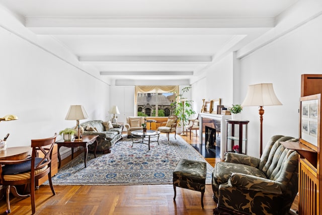 living room with beamed ceiling and parquet floors