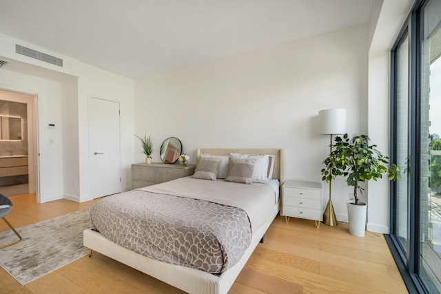30-05 Vernon Blvd Unit 2-B, New York City, NY 11102 - bedroom with light wood-style flooring and baseboards
