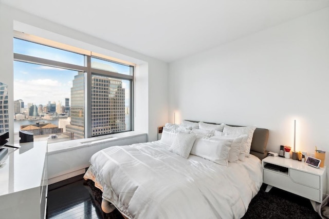 bedroom featuring hardwood / wood-style flooring