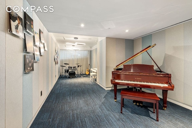 corridor featuring dark carpet and recessed lighting