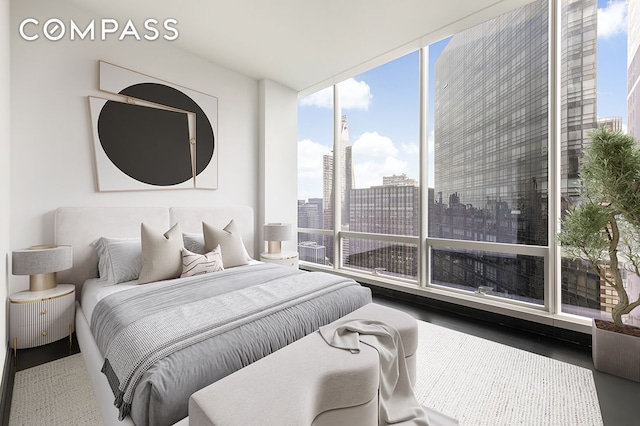 bedroom with floor to ceiling windows