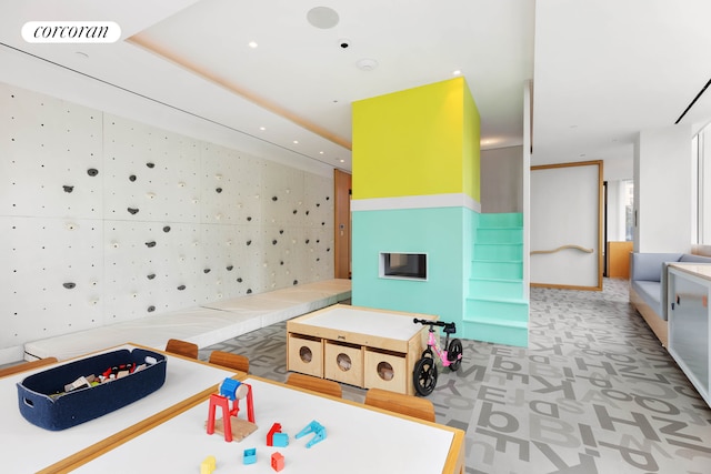 rec room with light colored carpet and recessed lighting