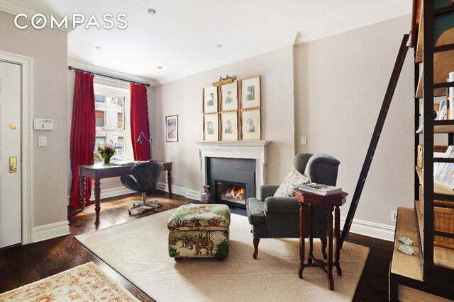 bedroom with light hardwood / wood-style floors and brick wall