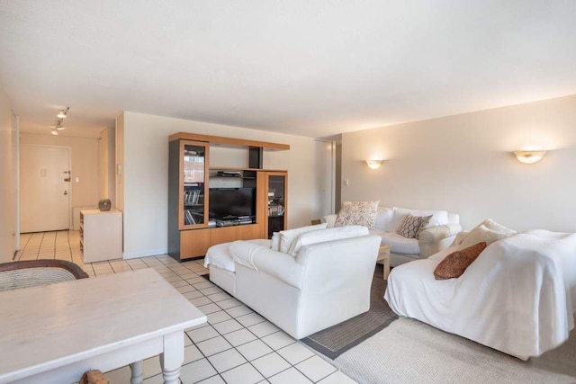 living room with light tile patterned floors