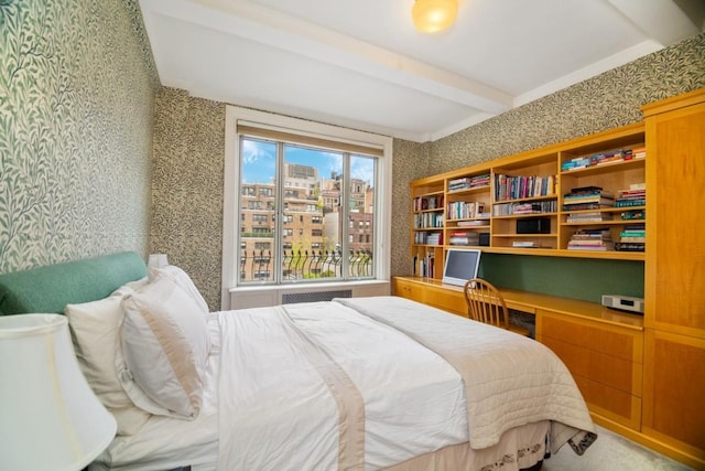 bedroom featuring beamed ceiling and radiator heating unit