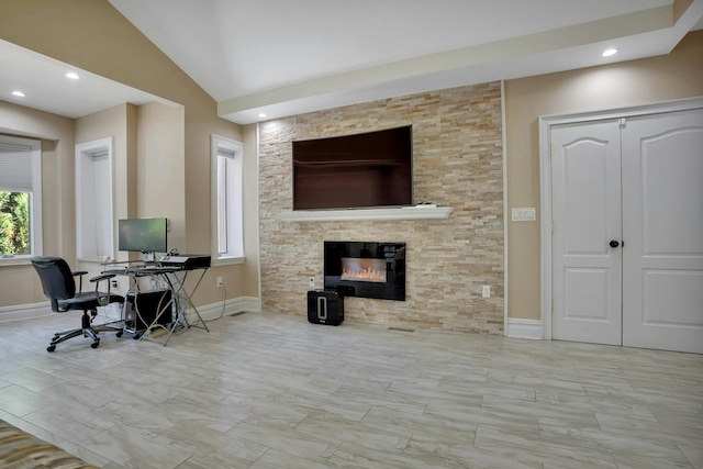 office with lofted ceiling, recessed lighting, a fireplace, and baseboards