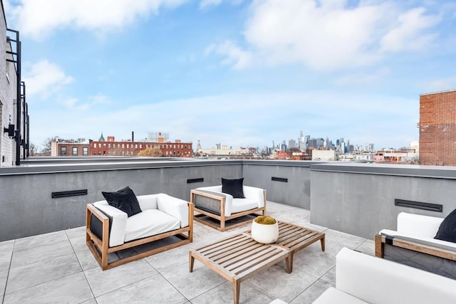 view of patio / terrace featuring an outdoor hangout area and a balcony