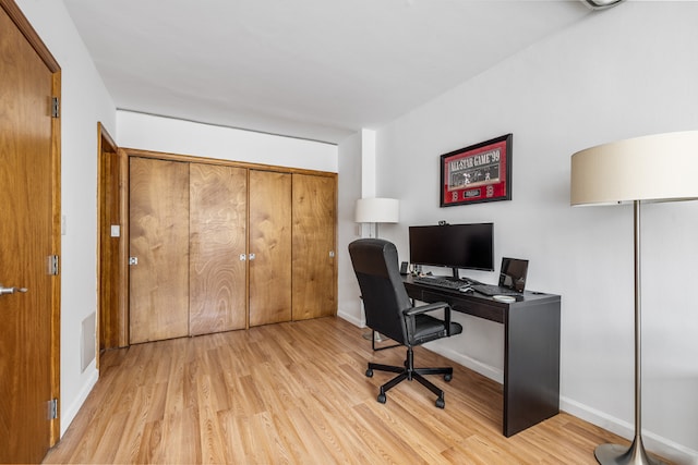 office space featuring light wood-type flooring