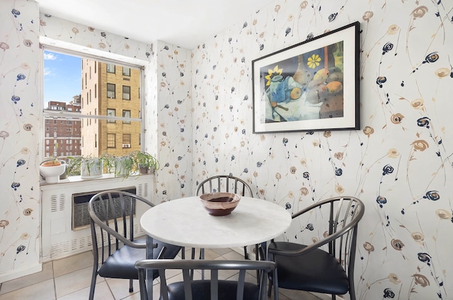 35 Sutton Pl Unit 11A, New York City, NY 10022 - dining space with wallpapered walls and light tile patterned floors