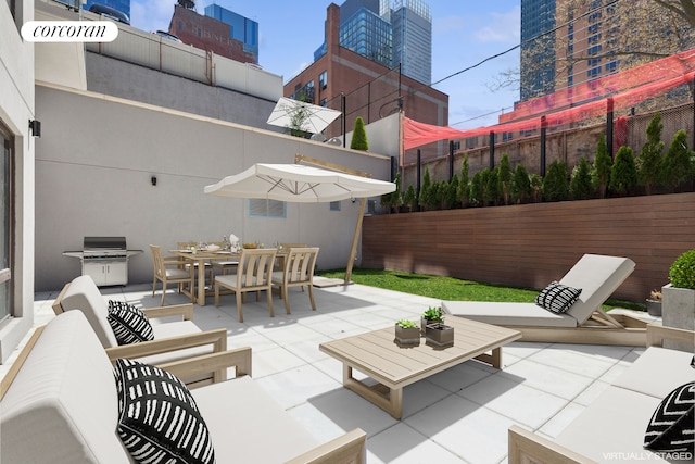 350 W 44th St Unit 101, New York City, NY 10036 - view of patio / terrace featuring outdoor lounge area, area for grilling, and outdoor dining area