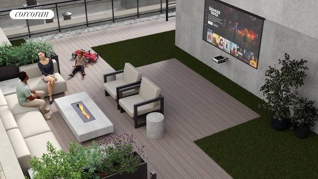 350 W 44th St Unit 101, New York City, NY 10036 - wooden deck featuring a fire pit