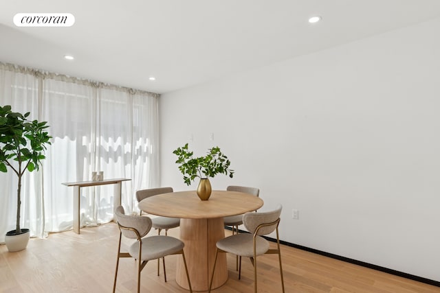 350 W 44th St Unit 101, New York City, NY 10036 - dining area with light wood-style floors, recessed lighting, and baseboards