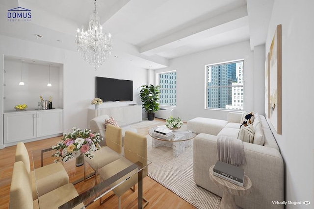 15 Broad St Unit 2206, New York City, NY 10005 - living area with light wood finished floors and a chandelier