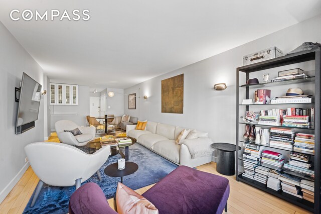 living room with hardwood / wood-style flooring