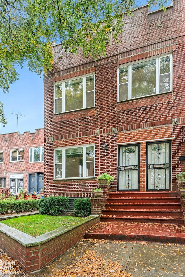191 Terrace Place, New York City, NY 11218 - view of front of house featuring brick siding and entry steps