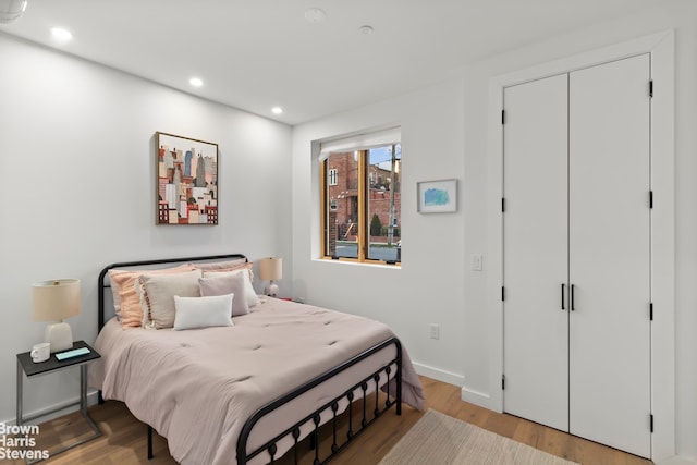 bedroom featuring light hardwood / wood-style floors