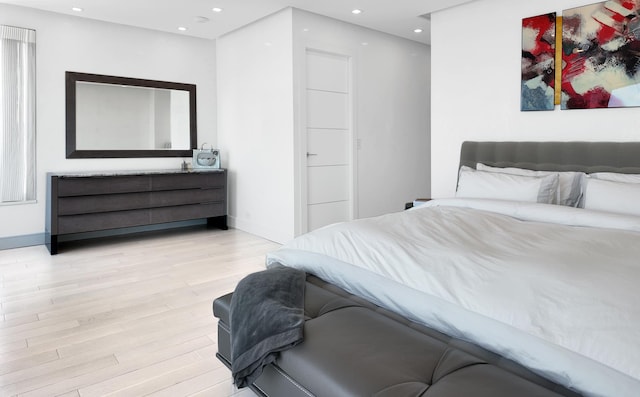 200 E 69th St Unit 31-A, New York City, NY 10021 - bedroom with recessed lighting and light wood finished floors