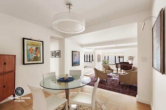 dining area with light parquet flooring