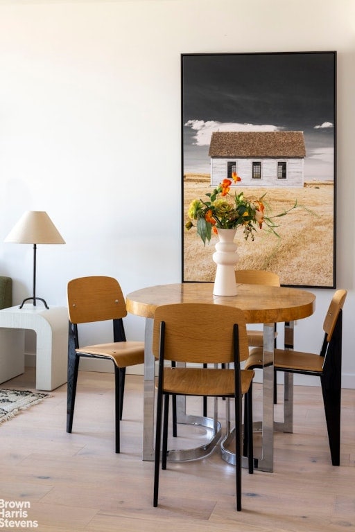 dining room with light wood-type flooring