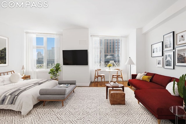 living room with light hardwood / wood-style floors