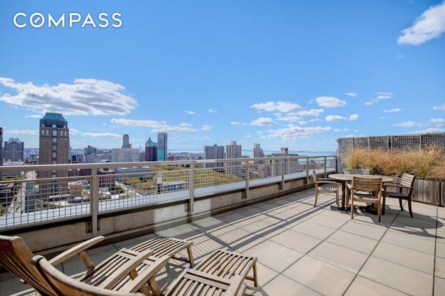 view of patio featuring a city view