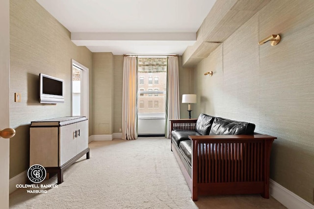 living room featuring light colored carpet and beam ceiling