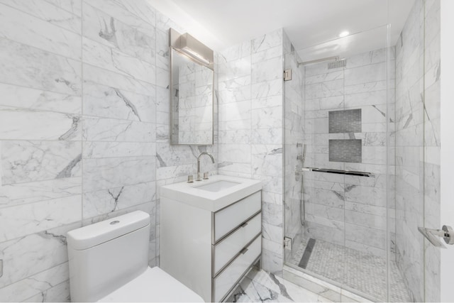 full bathroom featuring tile walls, a shower stall, toilet, and vanity