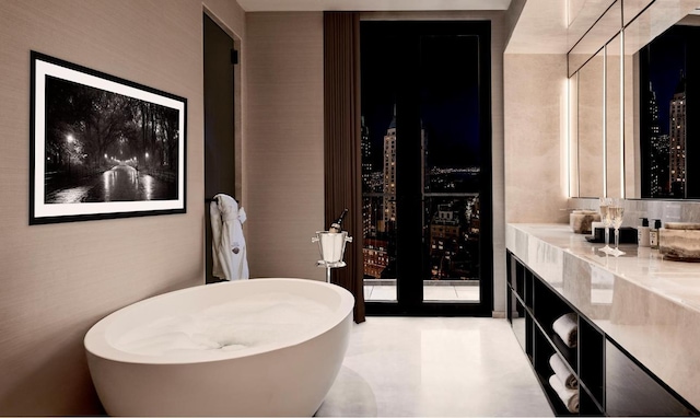 bathroom featuring vanity and a bathtub