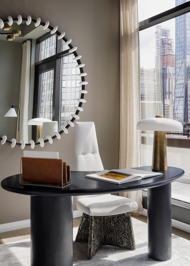 111 W 56th St Phc, Phc, New York City, NY 10019 - interior space with baseboards and a healthy amount of sunlight