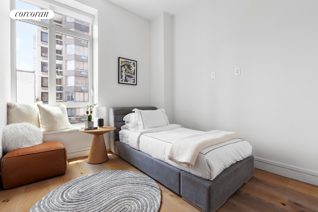 bedroom featuring hardwood / wood-style floors