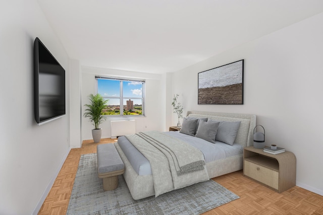 bedroom featuring baseboards